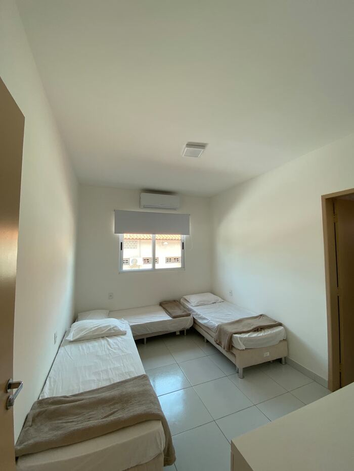 Quarto com camas de solteiro